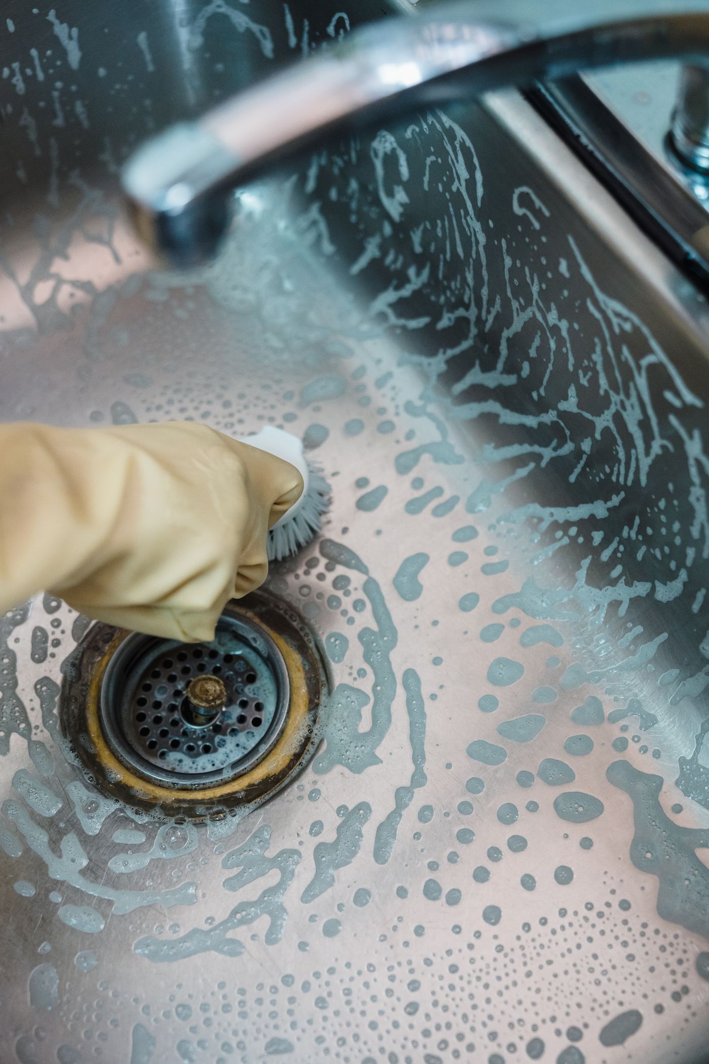 Cleaning grease buildup from a kitchen sink drain